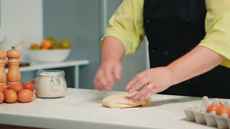 Close-up-of-woman-hands-kneading