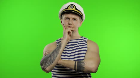 Young-sailor-man-thinks-and-gets-a-great-idea.-Seaman-guy-in-sailor's-vest