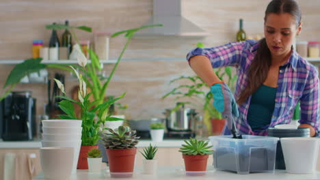 Florist-woman-checking-plants