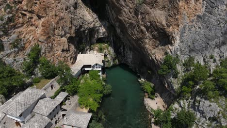 Tekija-in-Blagaj-and-the-source-of-the-Buna-river,-shot-by-drone,-the-Tekke-in-Blagaj-is-a-national-monument
