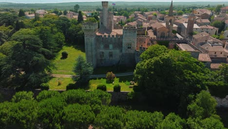 Aerial-view-of-scenic-medieval-renovated-castle-in-Pouzilhac,-France
