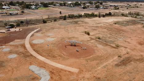 Aerial-view-of-a-strange-dinosaur-park-near-a-small-Australian-Outback-town