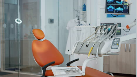 Close-up-of-dental-chiar-in-empty-dentist-stomatology-hospital-office-with-nobody-in-it