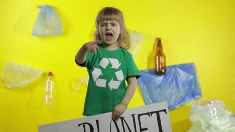 Girl-activist-hold-white-poster-Our-Planet-Needs-Help.-Plastic-nature-pollution
