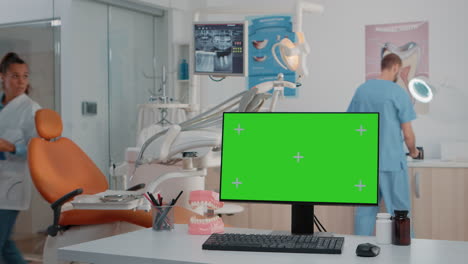 Horizontal-green-screen-on-computer-in-dental-cabinet