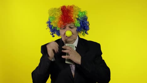 Clown-businesswoman-entrepreneur-in-wig-holds-one-buck-money-income-and-loses-it