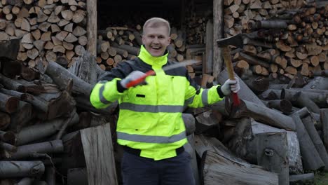 Crazy-lumberjack-dancing-with-small-axe-and-saw.-Man-woodcutter-celebrate.-Sawmill-background