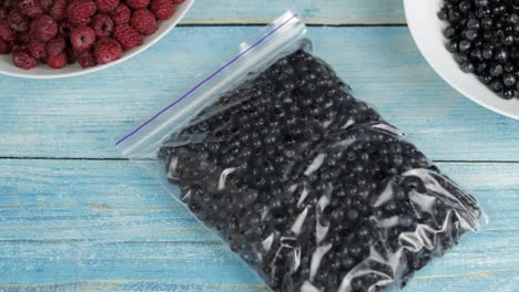 Packages-with-blueberries-in-zipper-plastic-bags-for-freezing.-Frozen,-preservation-berries-food