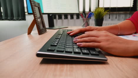 Person-typing-on-computer-keyboard
