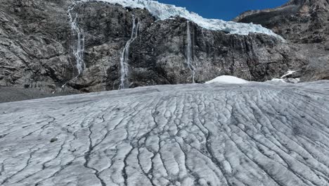 Aerial-Forward-Drone-cruise-Closeup-Shot-of-Fellaria's-Glacier-and-its-Waterfalls---Valmalenco---Sondrio