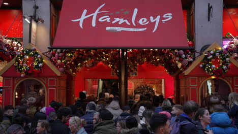In-slow-motion-Christmas-shoppers-queue-outside-the-famous-Hamlets-toy-store-on-Regent-Street