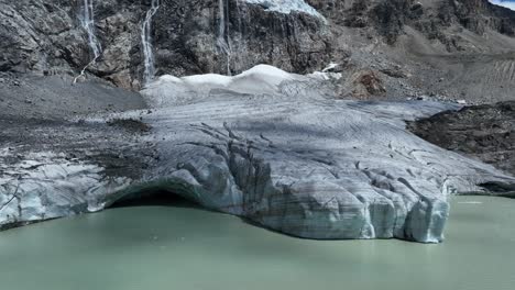 Aerial-Panning-right-Drone-Shot-of-Fellaria's-Glacier-and-its-Oriental-Lake---Valmalenco---Sondrio