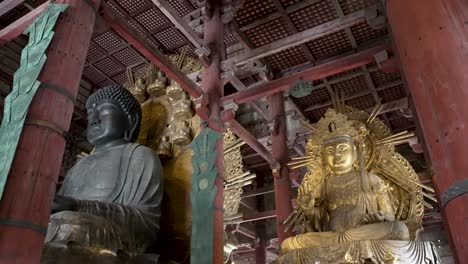 The-Great-Buddha-in-the-main-hall-at-Tōdai-ji-in-Nara,-gold-one-is-called-Nyoirin-kannon