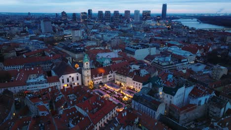 Bratislava's-Old-Town-with-modern-Business-Downtown-buildings-and-Christmas-markets-on-the-Main-Square-in-Evening