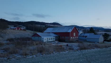 Indre-Fosen,-Trondelag-County,-Norway---A-Sight-of-Farmhouses-in-the-Month-of-November---Aerial-Pullback