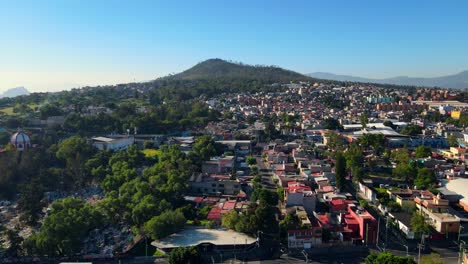 Aerial-view-establishing-Iztapalapa-south-of-Mexico-City,-Cerro-de-la-Estrella-National-Park