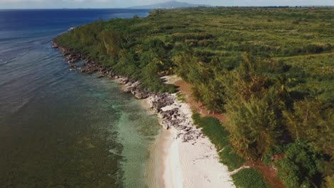 Drone-shot-of-an-island-beach-at-Tinian,-Northern-Mariana-Islands