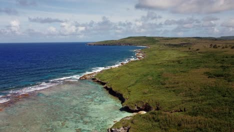 Drone-shot-of-coastline-of-Tinian,-Northern-Mariana-Islands