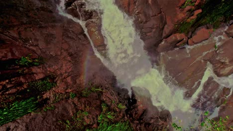Aerial-glimpse-captures-the-serene-beauty-of-Bijagual-Waterfall-nestled-amidst-Costa-Rica's-vibrant-and-untouched-natural-surroundings