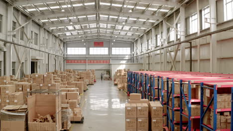 Hundreds-of-packaged-goods-are-awaiting-shipment-in-a-large-Chinese-factory-warehouse