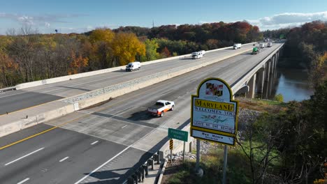 Maryland-Welcomes-You-state-sign-along-bridge-over-Potomac-River