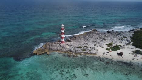 Aerial-view-of-Vintage-Lighthouse-on-Caribbean-sea-coast-in-Punta-Cancun,-Mexico