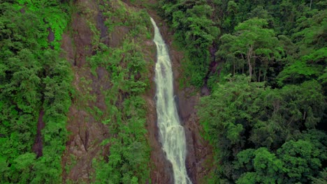Drone-shot-of-waterfall-deep-in-jungle-of-Costa-Rica