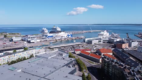 Cruise-ships-moored-in-Tallinn-harbor,-aerial-drone-view