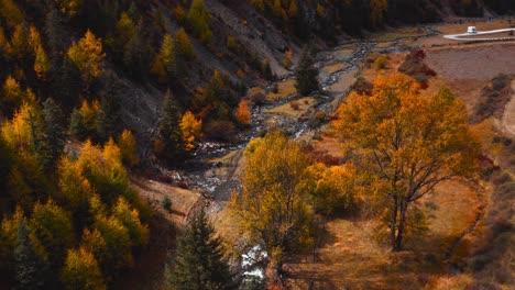 Stream-Flowing-Through-The-Valley-During-Autumn-In-Jiagenba,-Xinduqiao,-Sichuan-Province,-China
