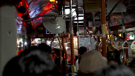 Inside-View-Of-Busy-Local-Kyoto-Bus-At-Night