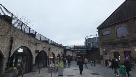 Coals-Drop-Yard-On-Overcast-Winters-Day-In-Kings-Cross-With-People-Walking-Past