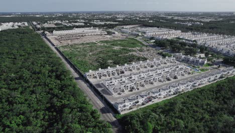 Drone-shot-of-development-building-in-Cancun,-Playa-del-Carmen,-Tulum-area,-Yucatan-in-Mexico
