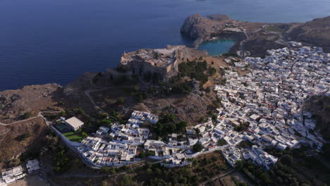 Circling-aerial-shot-of-Lindos-town-and-Acropolis-Rhodes