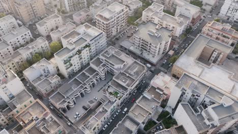 Aerial-flyover-of-the-buildings-in-the-town-of-Monopoli,-Italy