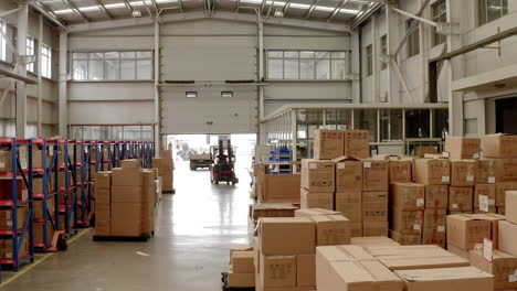 A-forklift-is-parked-between-boxes-at-a-warehouse-of-a-Chinese-factory