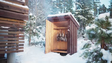 Wooden-Smokehouse-With-Deer-Meat-Using-Cold-Smoking-Method
