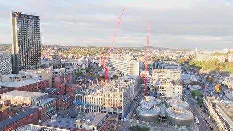 Large-construction-cranes-in-the-city-centre-of-Sheffield-during-sunrise
