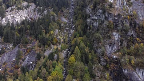 Drone-on-the-forest-in-Val-di-Mello,-Italy