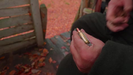 Close-up,-an-ammunition-clip-is-loaded-with-lead-free-hunting-cartridges