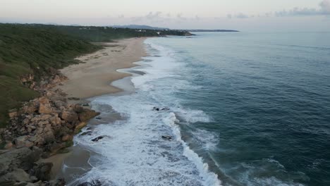 Aerial-of-sand-dunes-isolated-lonely-solitary-beach-in-mexico-Oaxaca-Puerto-escondido-at-sunset