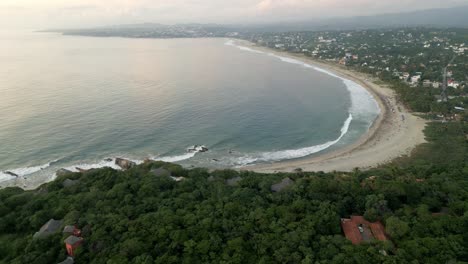 aerial-high-angle-revealing-Puerto-escondido-beach-Oaxaca-mexico-surf-travel-destinations