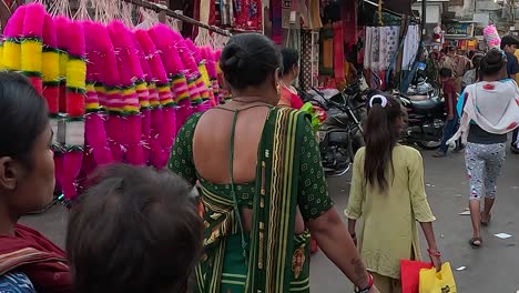 On-the-street-road-there-are-many-small-traders-selling-things-and-women-shopping