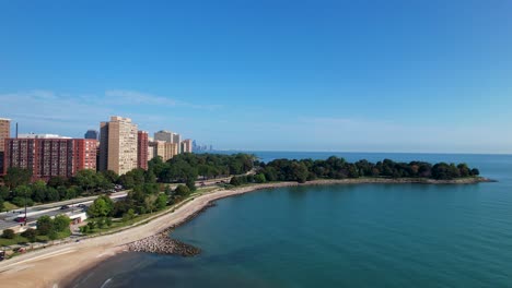 City-Beach-Water-Front-City-Scene-With-Green-Park-Drone