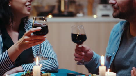 Couple-with-red-wine-glasses