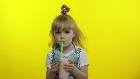 Child-drinking-milk-cocktail.-Travel-blogger-tourist-with-milkshake-drink.-Cold-drink-for-hot-summer