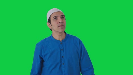 Frustrated-Muslim-man-flying-a-mosquito-Green-screen