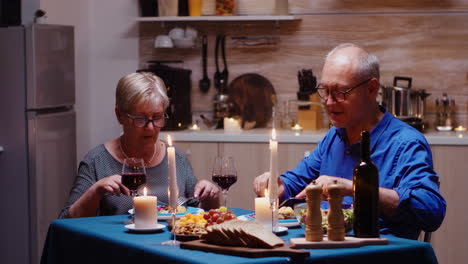 Couple-with-red-wine-glasses