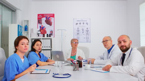 Group-of-specialist-doctors-having-video-meeting
