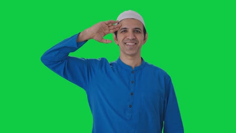 Happy-Muslim-man-saluting-on-camera-Green-screen