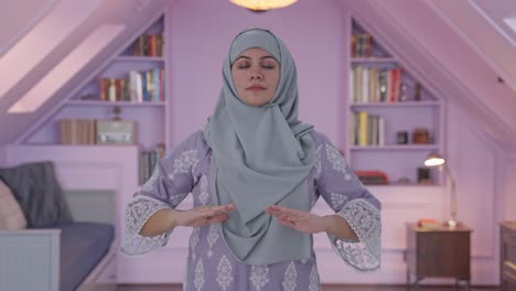 Happy-Muslim-woman-doing-Yoga